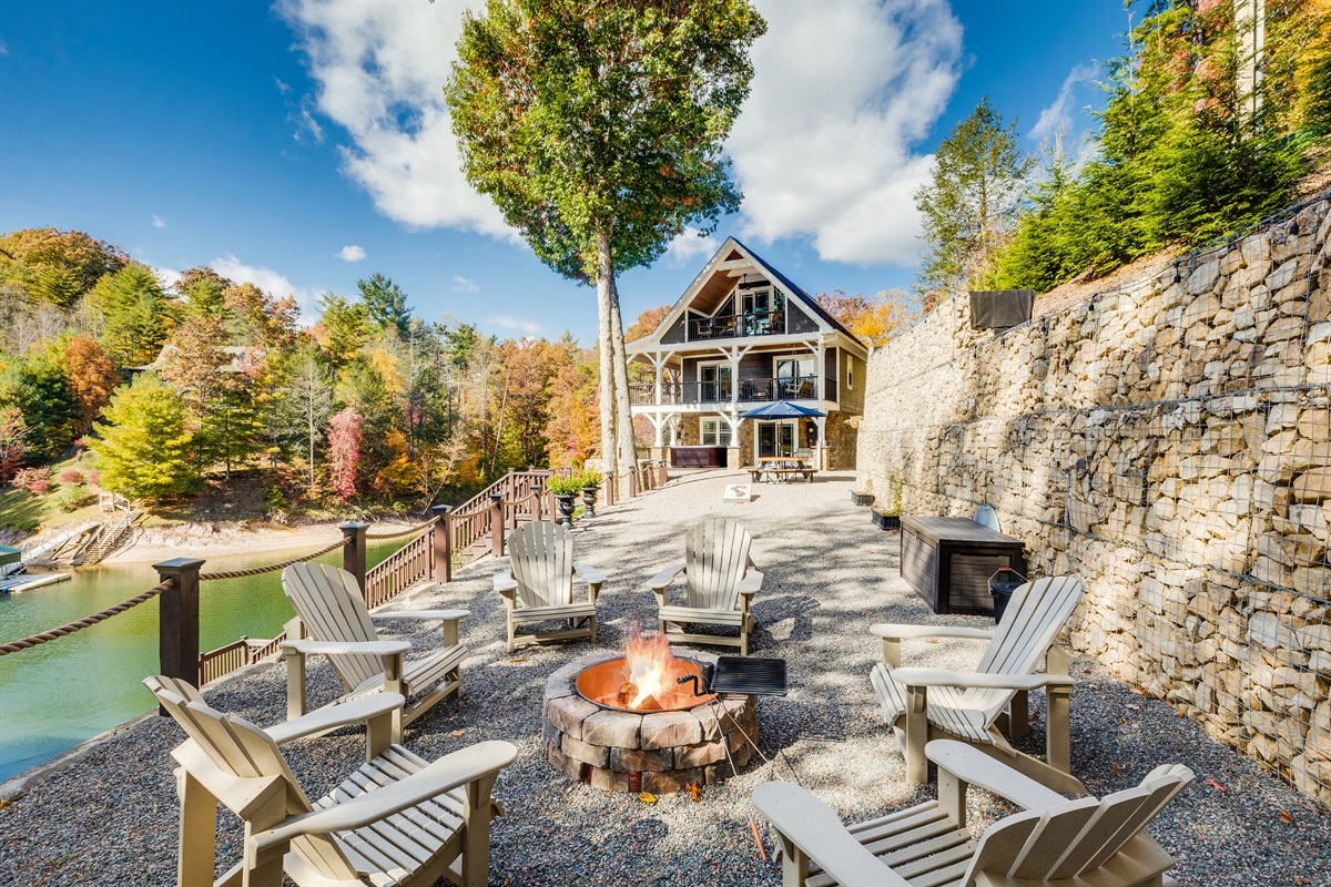 Skipping Stones Getaway Backyard with hot tub, fire pit, wood, roasting forks, corn hole boards, picnic table