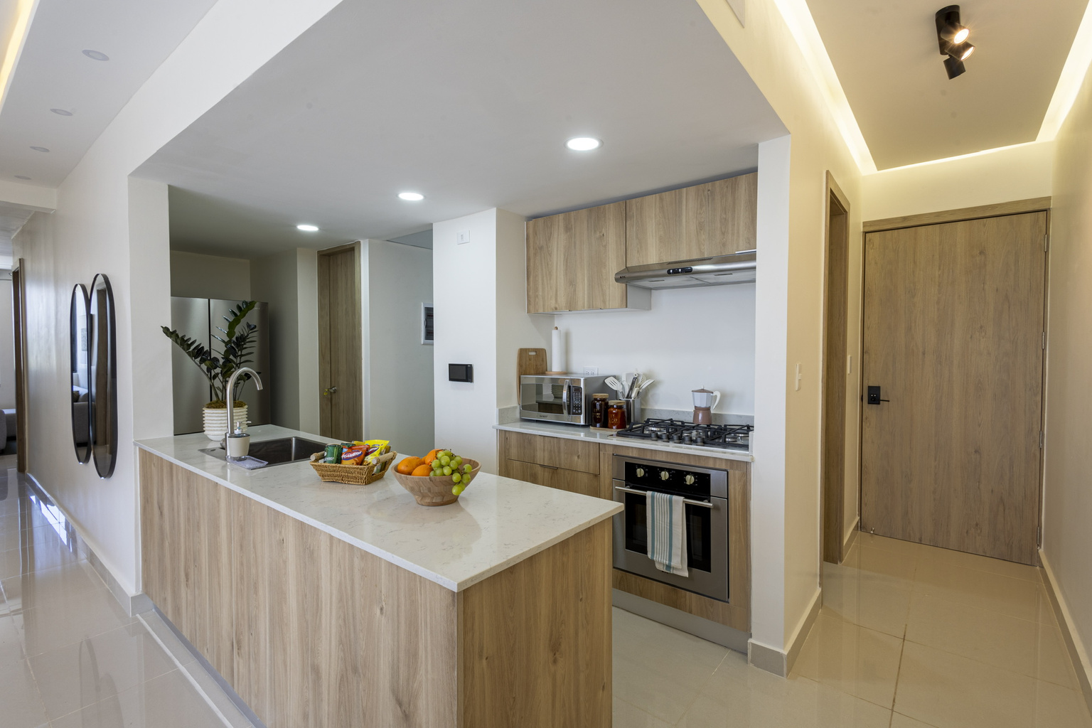 Bright, modern kitchen with a spacious island and everything you need to cook, snack, and feel right at home. 🍳✨