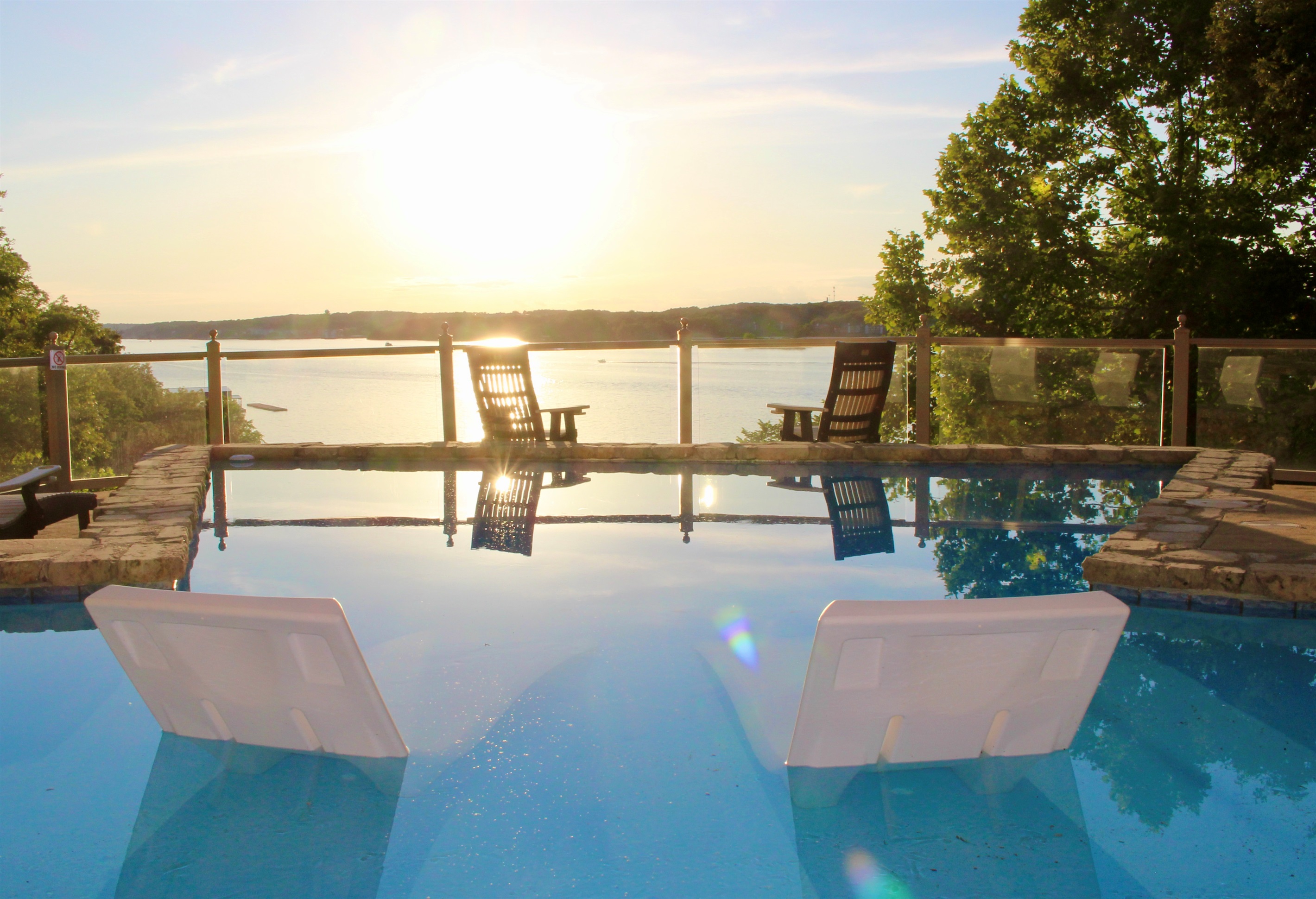 Enjoy magnificient sunset views of the lake from the pool.