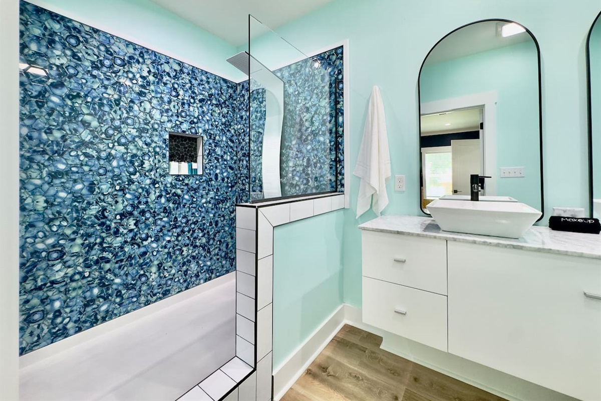Feel at home in this clean, spacious, and calming bath.