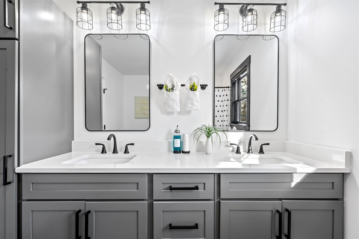 Getting ready in style.  The spacious vanity and ample storage make this master bath a dream.