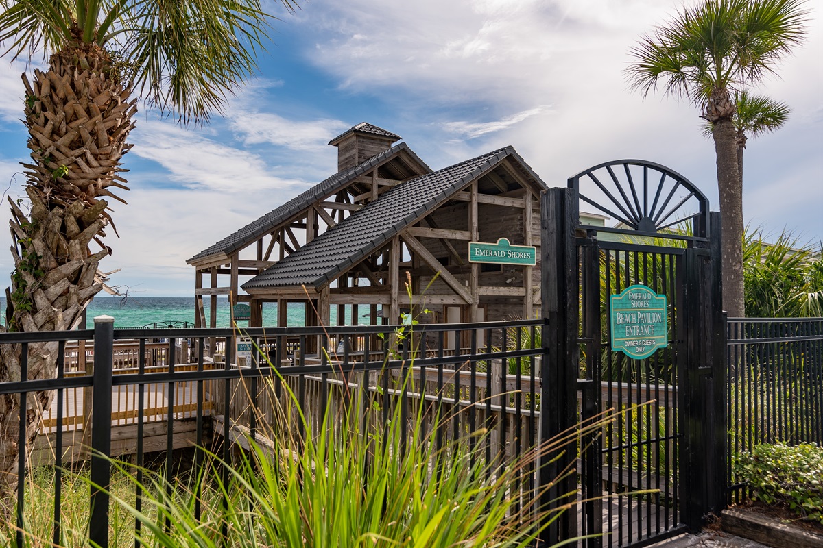 Beach pavilion and gated walkway to the Gulf