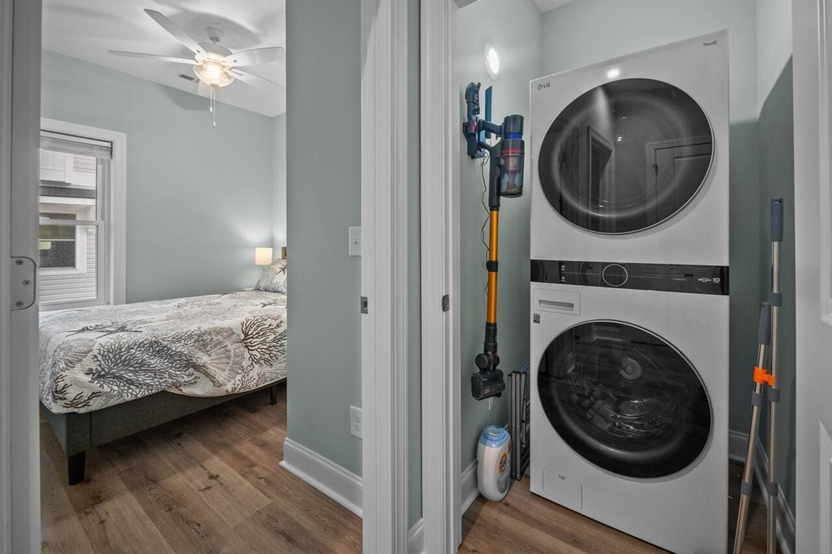 Full size washer and dryer on first floor outside queen bedroom