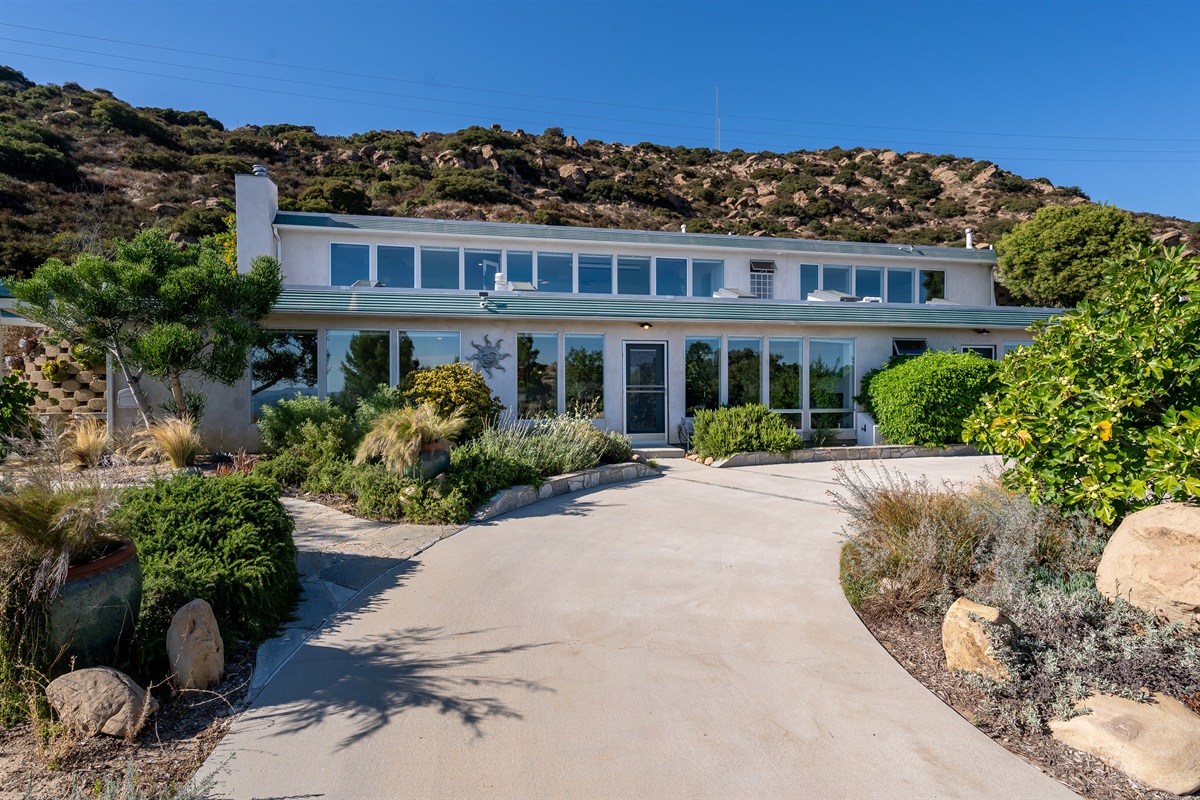 front door entry with private roundabout driveway