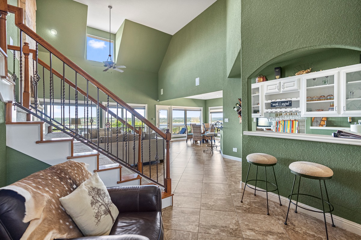Welcoming entryway that opens into the main living area with easy access to the kitchen, family room, and master suite.