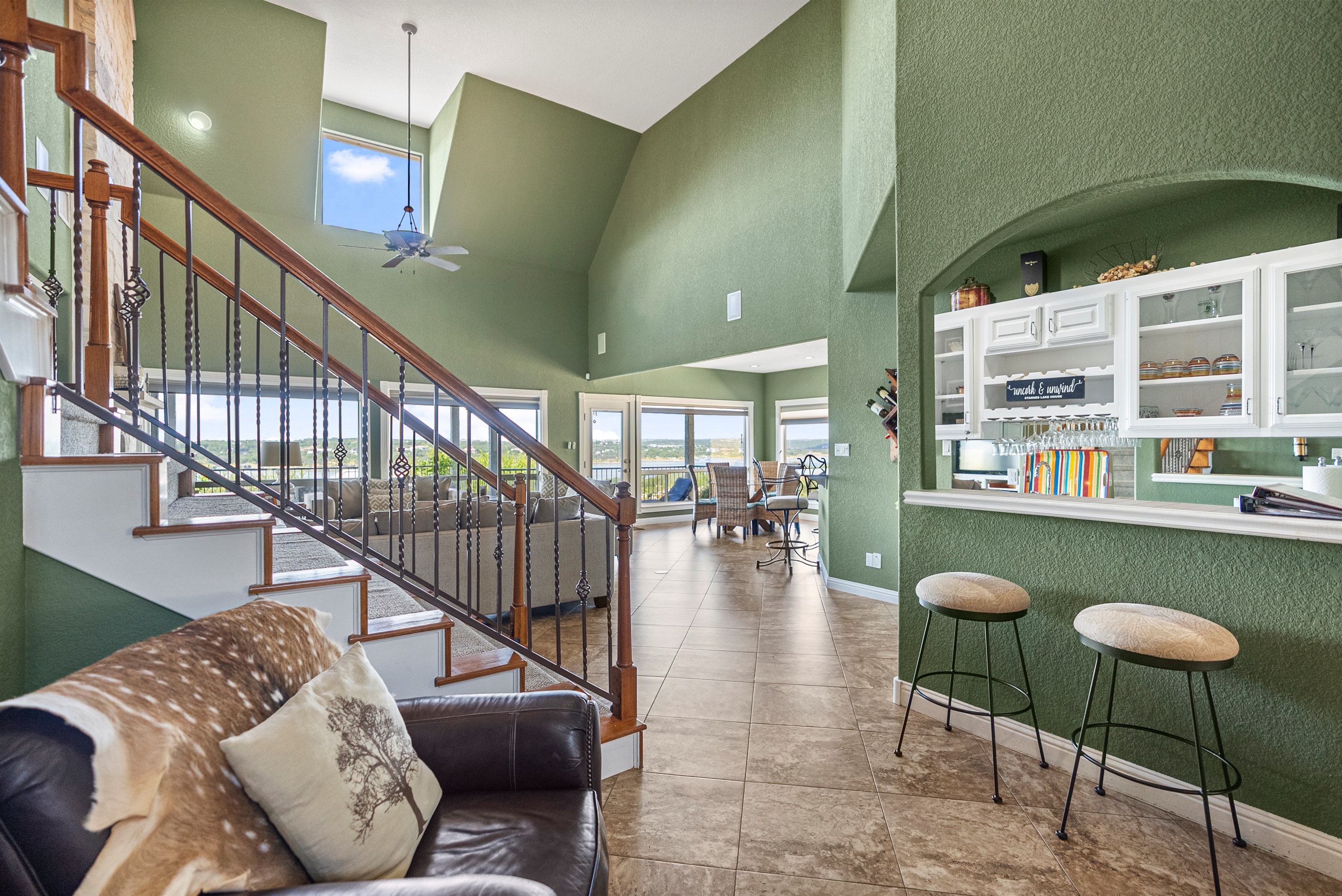 Welcoming entryway that opens into the main living area with easy access to the kitchen, family room, and master suite.