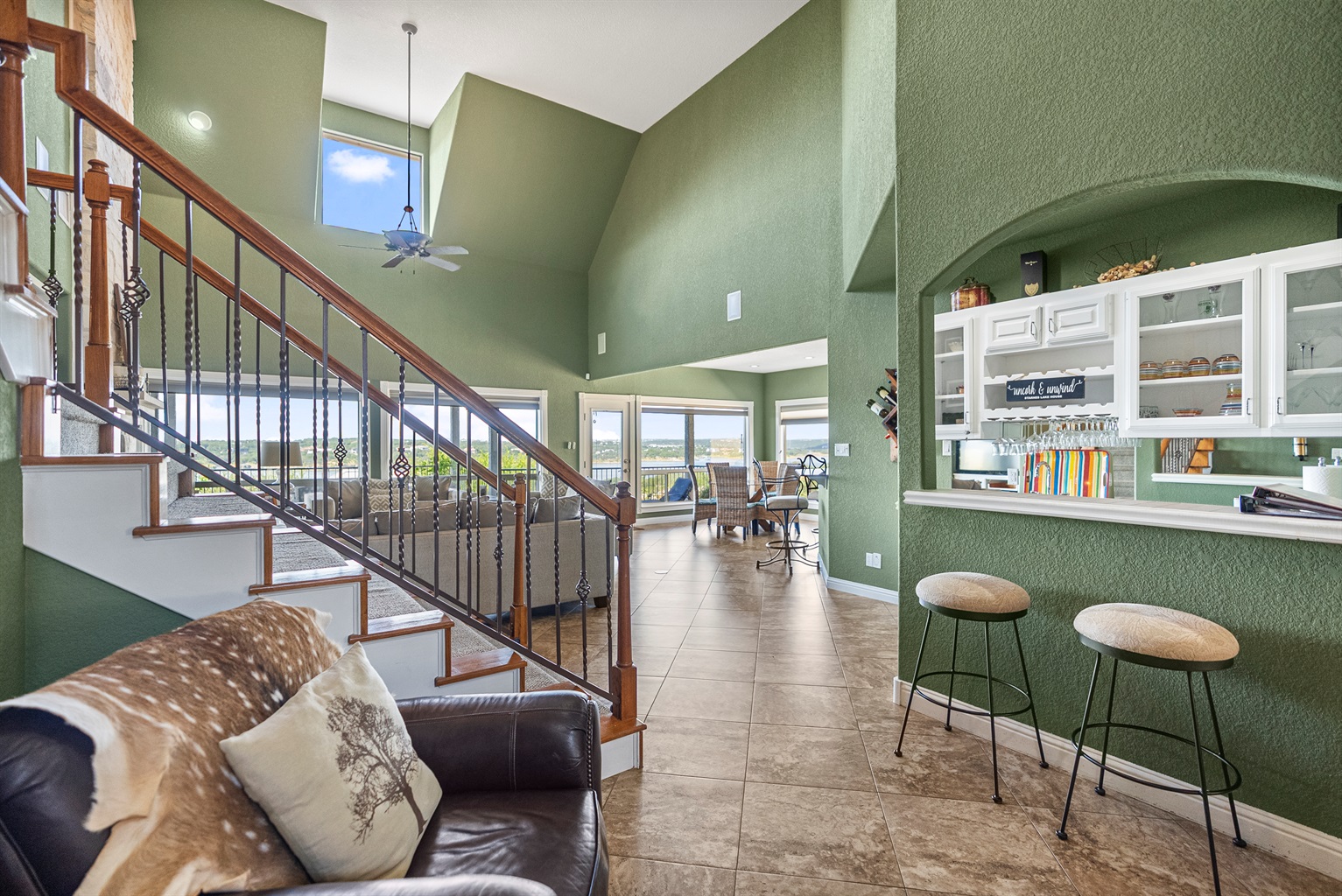 Welcoming entryway that opens into the main living area with easy access to the kitchen, family room, and master suite.