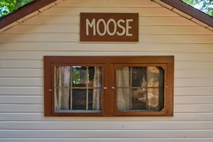 Moose sign on the top of the house