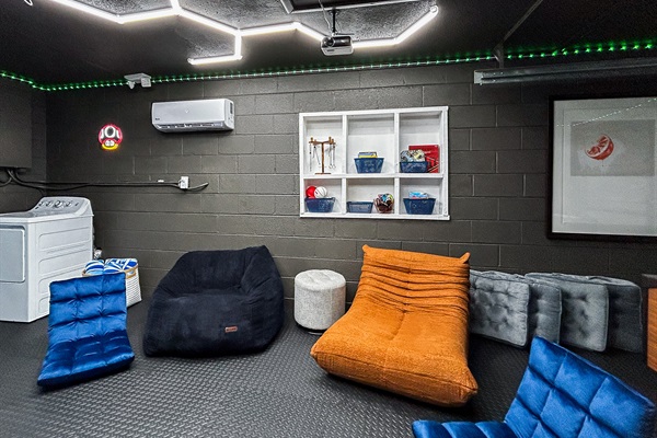 Garage Game Room Air Conditioned with Foosball, Nintendo Switch with Mario Kart, Just Dance & more. Comfortable Seating, Foam Mat Flooring, LED Lights, Mini Basketball, Games, Books & More