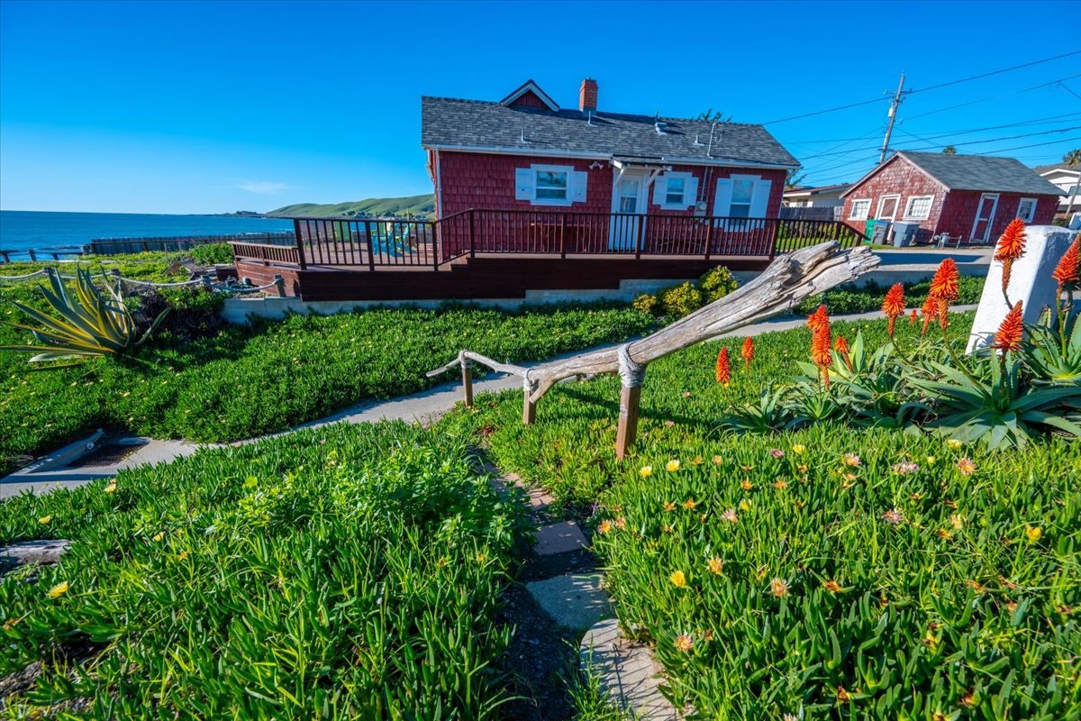 Private pathway connects to public beach access