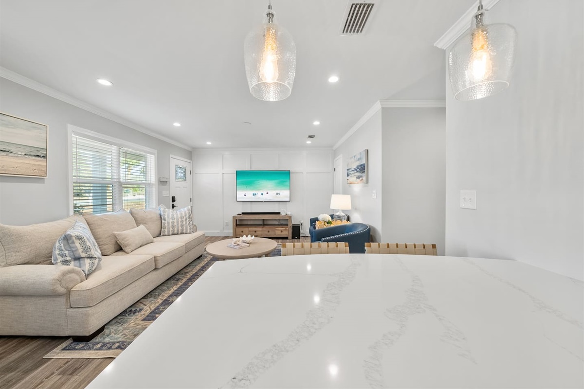 Living room of Unit B with a sleeper sofa. 
