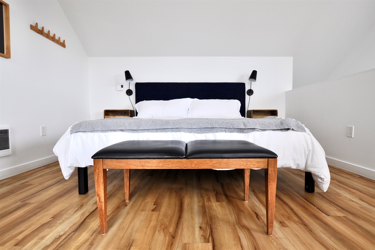 King bed with quality linens and plenty of room.