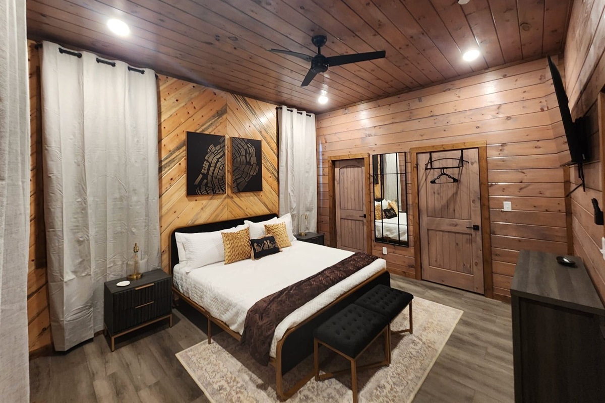 Rustic elegance with a king bed and inviting decor.