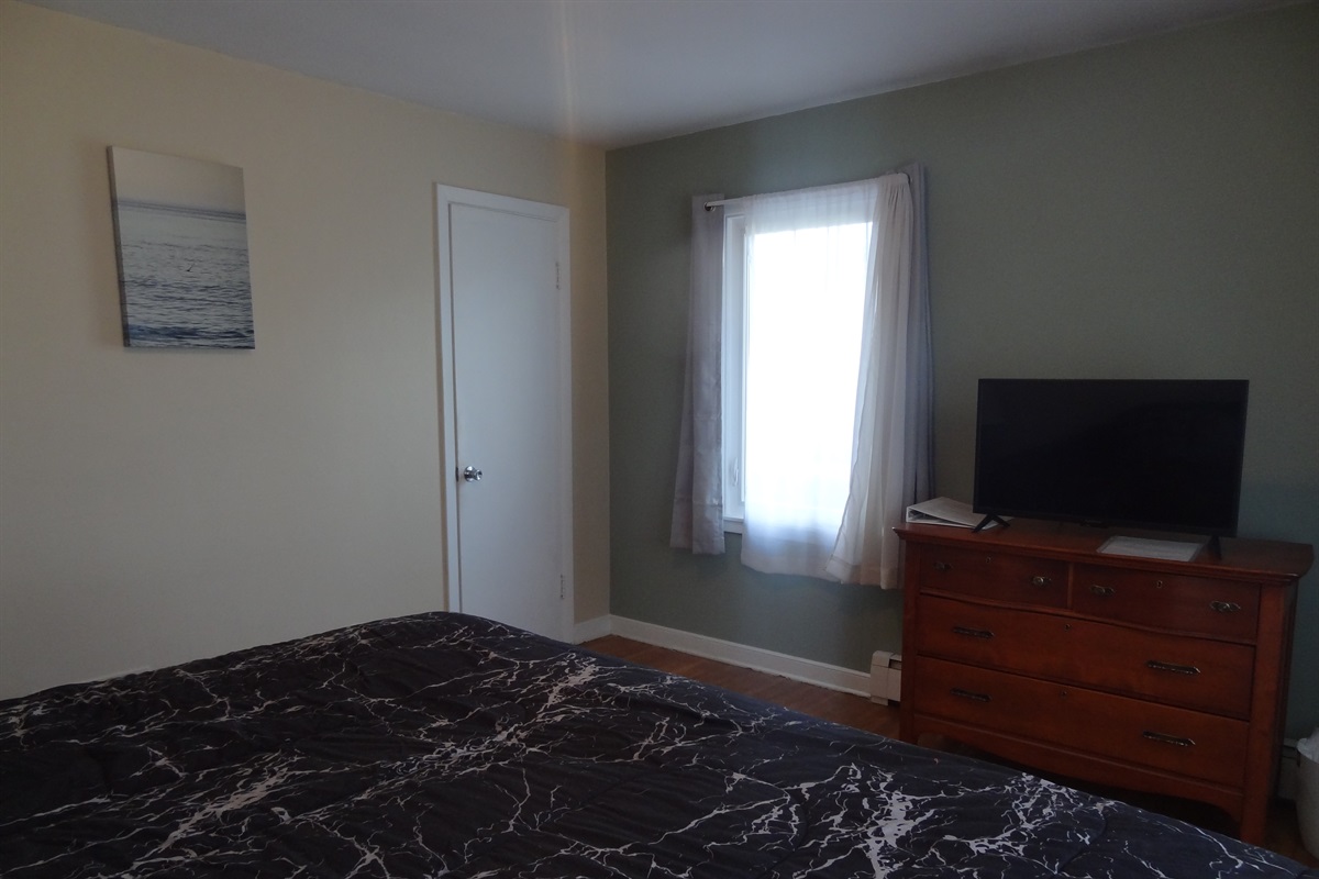 King bed with Roku smart TV