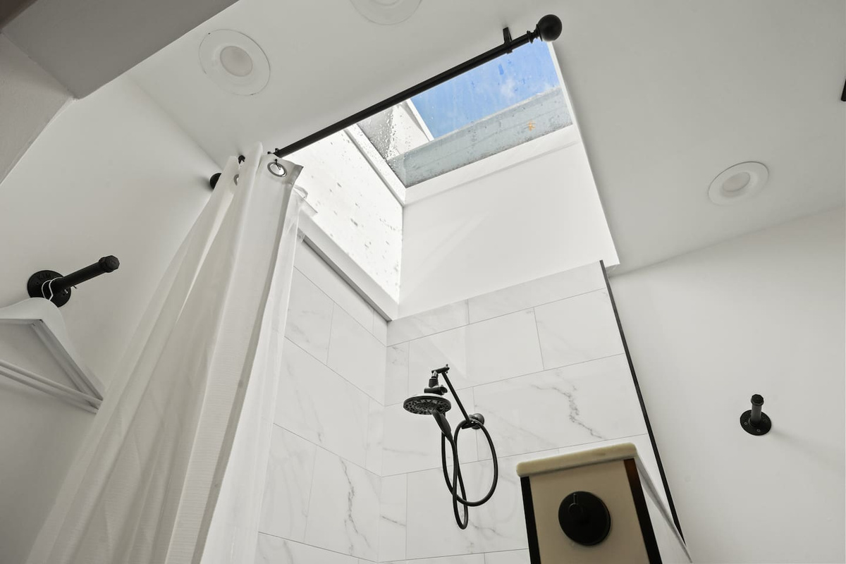 Wake up with a sunny shower. Skylight in our full bath. 