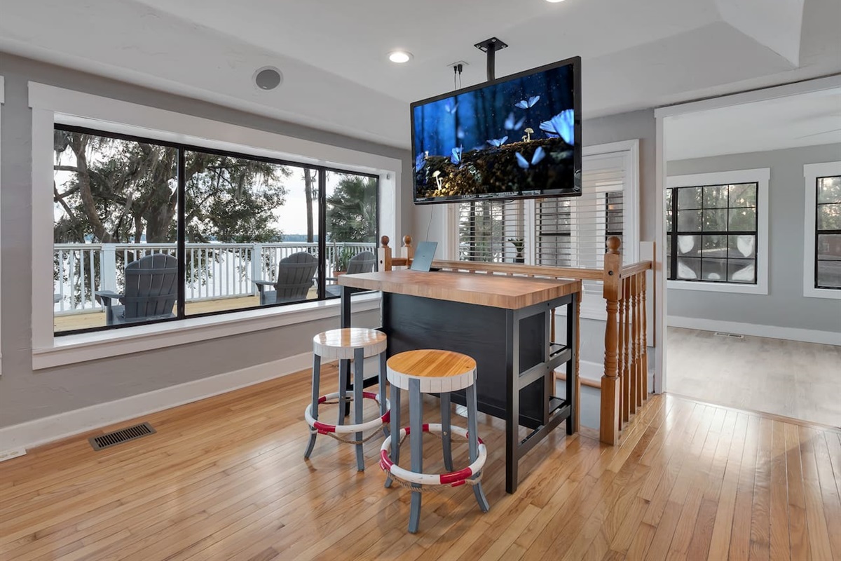 Pool table, lake view, stool seating, tv