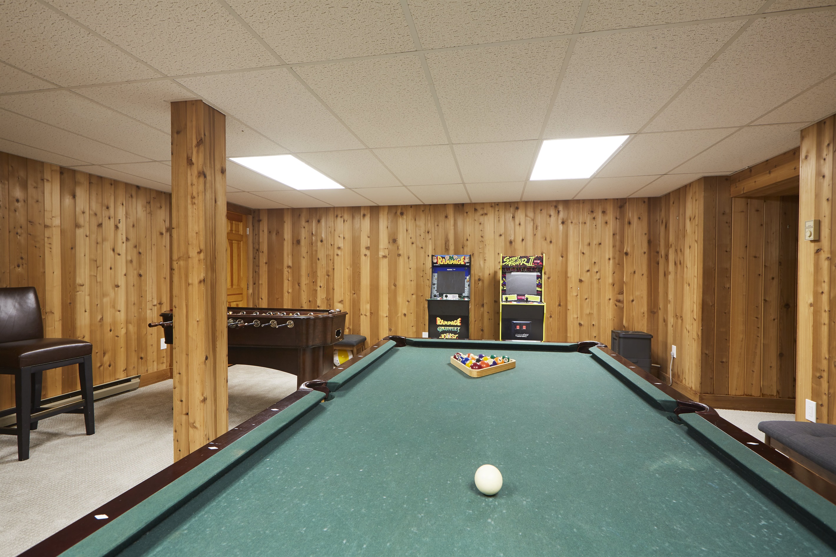 The pool table and darts are game room highlights.