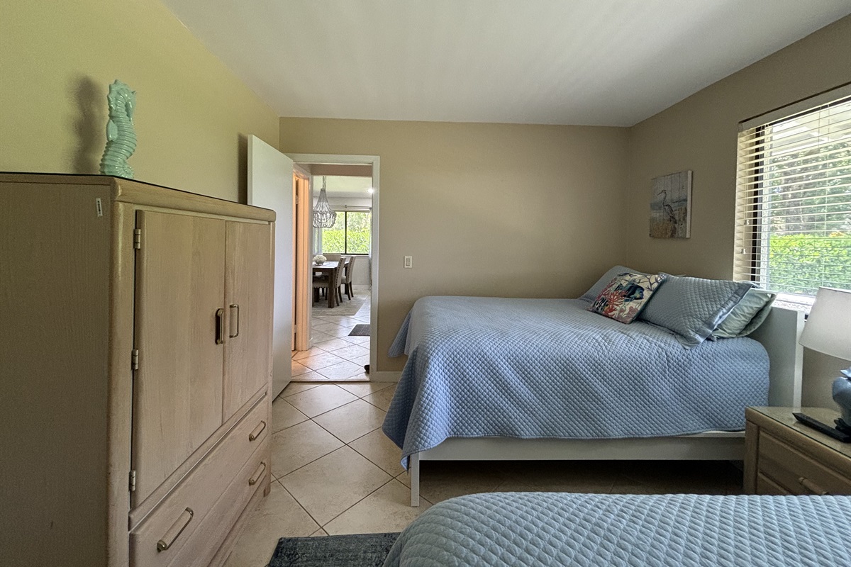 The front bedroom has two twin beds, a closet and dresser for plenty of storage during the course of your stay.