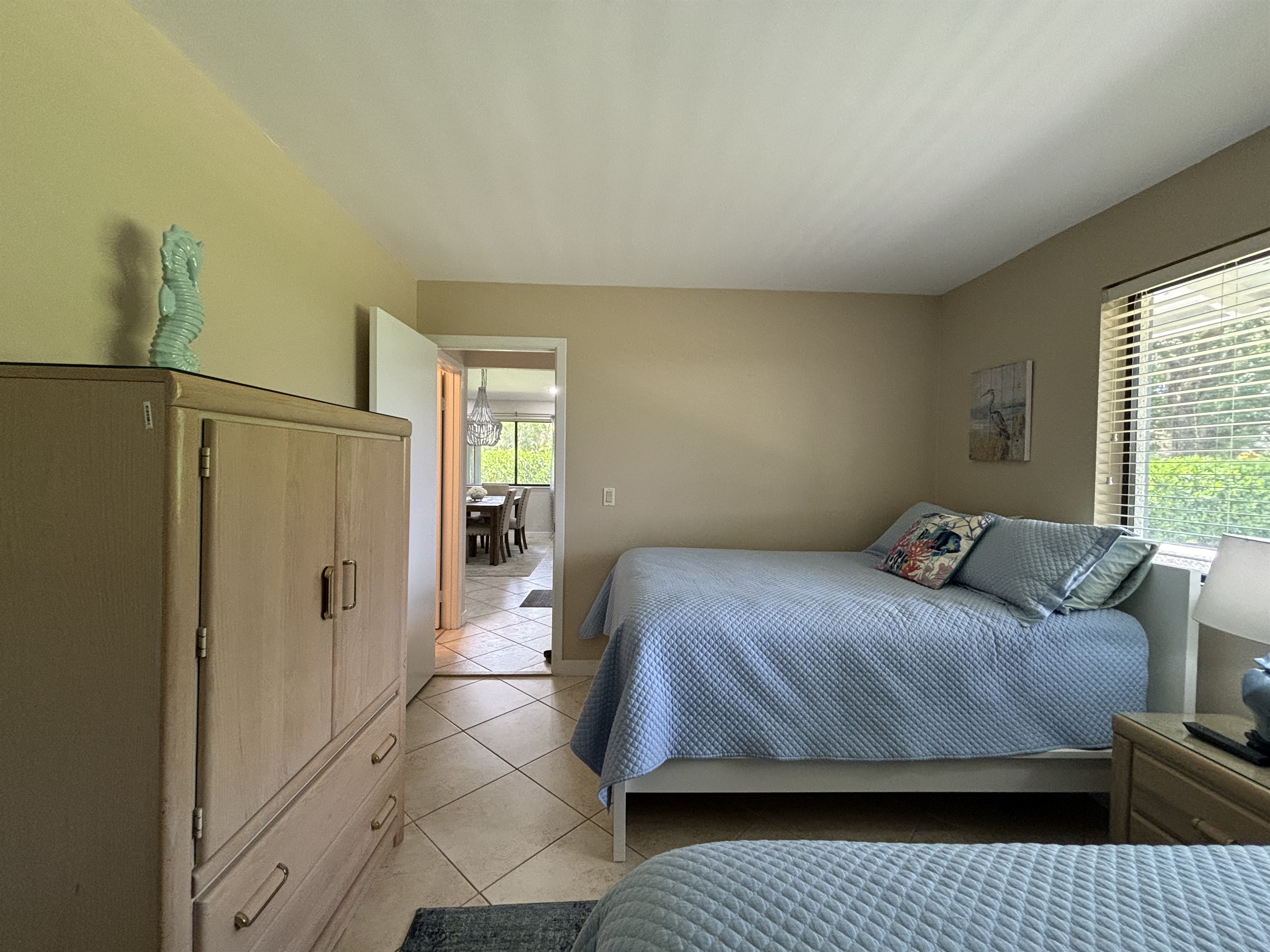 The front bedroom has two twin beds, a closet and dresser for plenty of storage during the course of your stay.