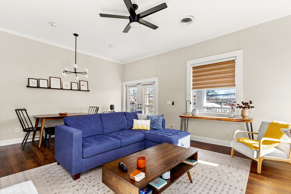 A symphony of comfort and entertainment, where the sofa is your throne, and the TV is your portal to a world of stories. Welcome to the ultimate living room experience