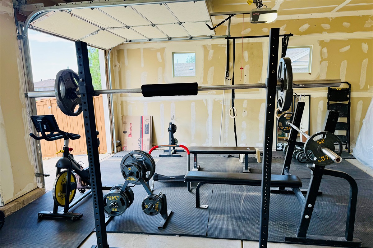 Private gym with everything you need and more to keep up with your workout while out of town! Bike, weight bench, rings, and more!
