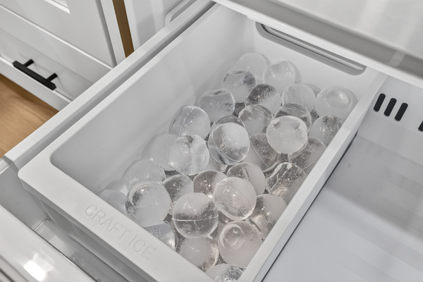 The refrigerator’s craft-ice maker creates slow-melting ice spheres—perfect for keeping your favorite drink refreshingly cold.
