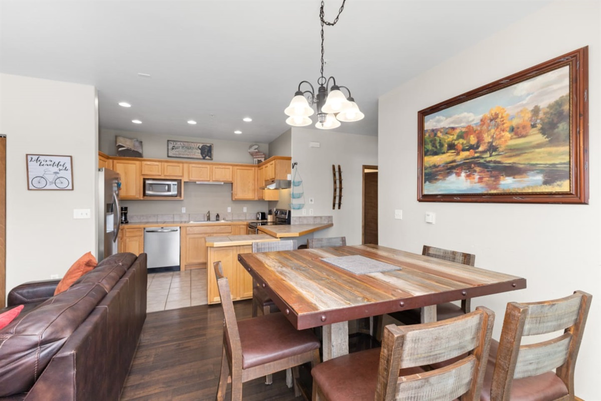 Dining Area with Kitchen in background