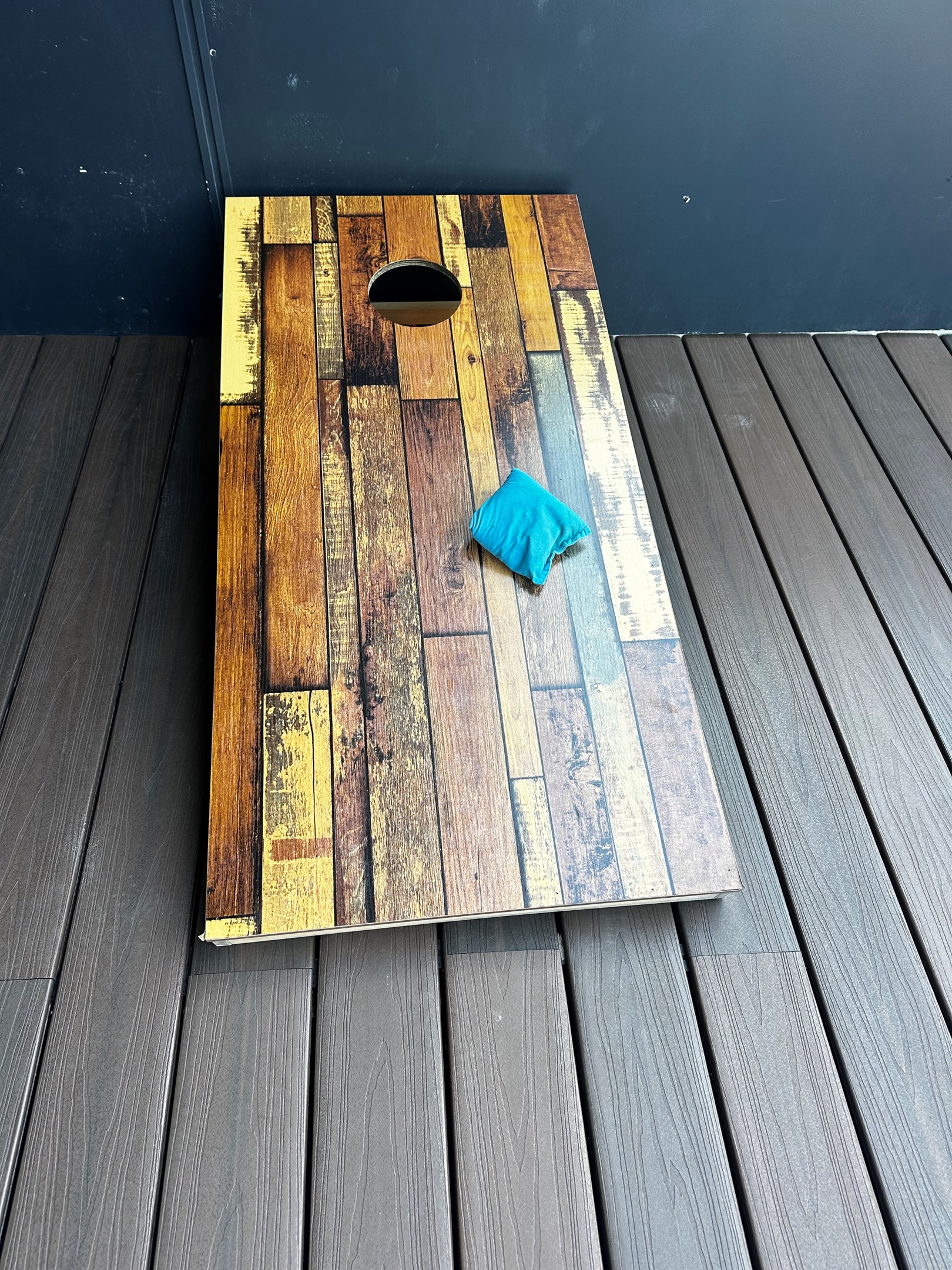 Enjoy a game of corn hole with your friends on the rooftop