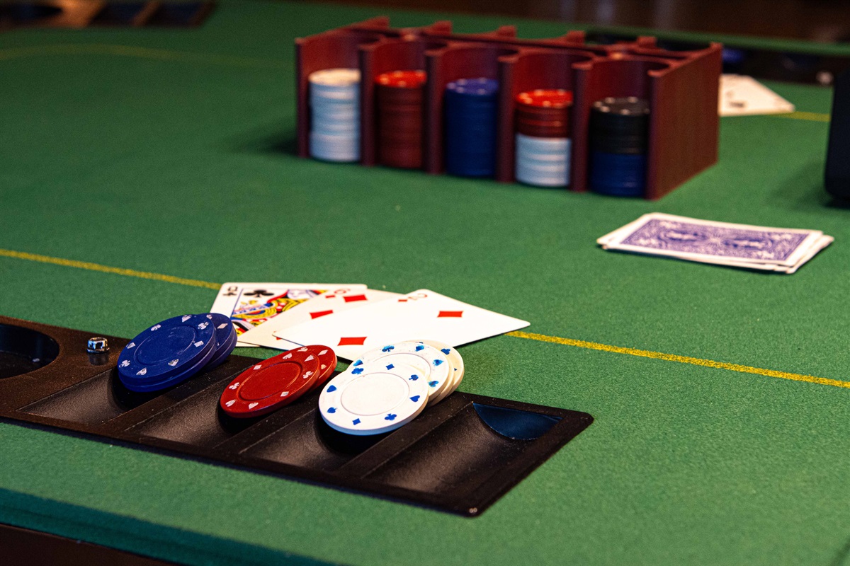 Raise the Stakes: Test your luck at the poker table in our game room.