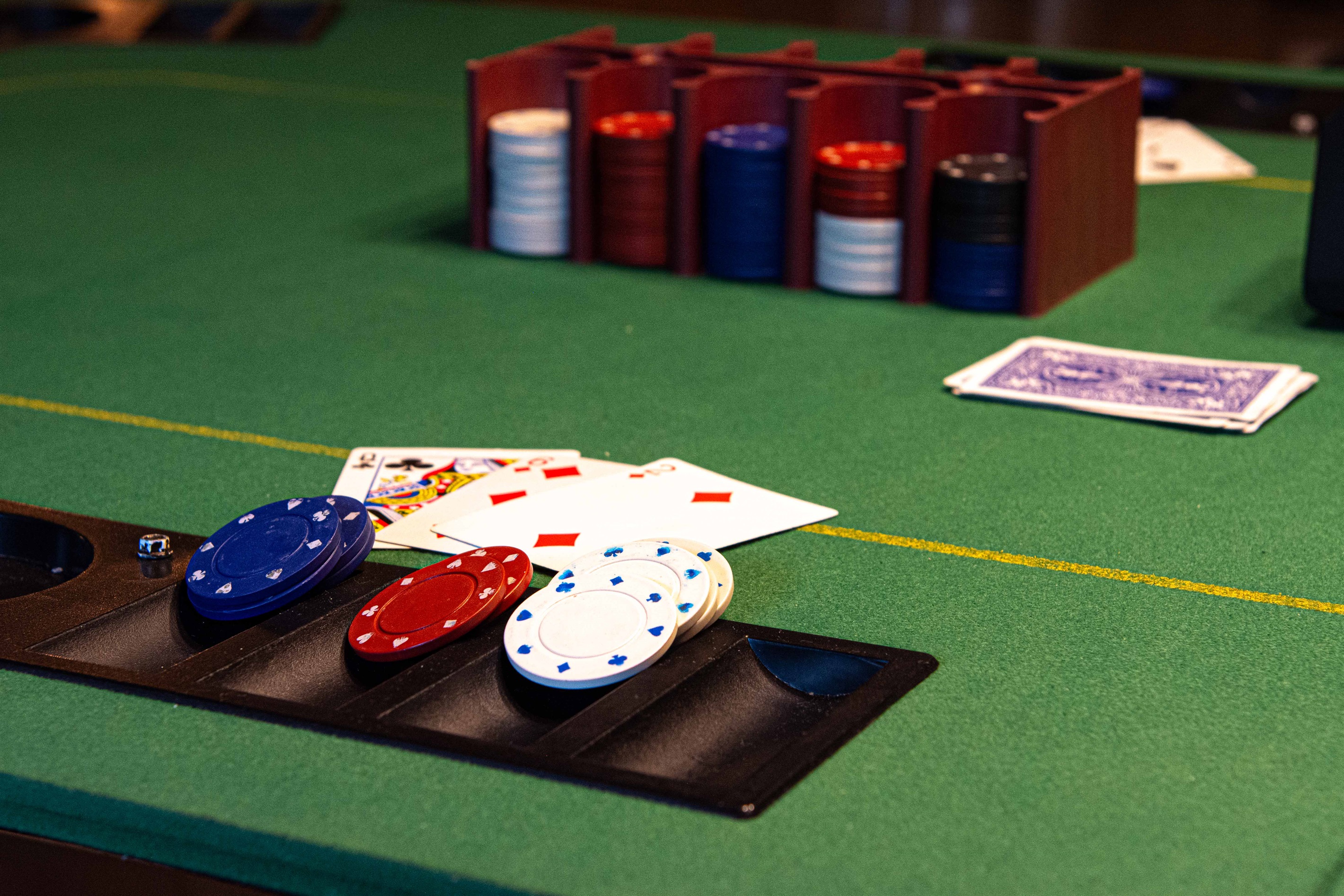 Raise the Stakes: Test your luck at the poker table in our game room.