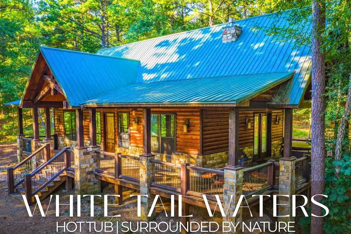 White Tail Waters: a 1-bedroom hideaway with a king bed, sleeper sofa, and hot tub. Cozy and romantic, perfect for 2–4 guests.