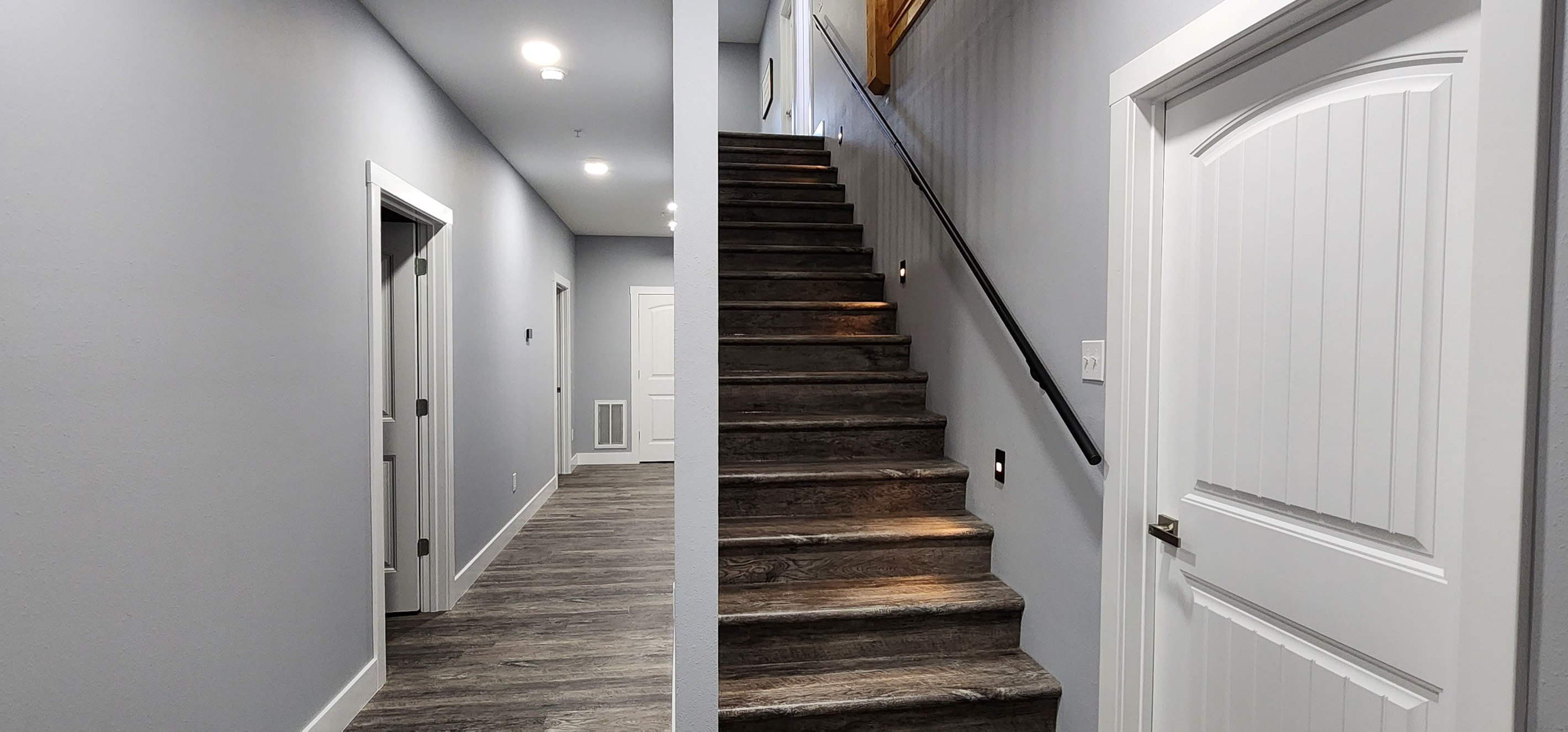 Interior staircase linking shared spaces and sleeping areas.