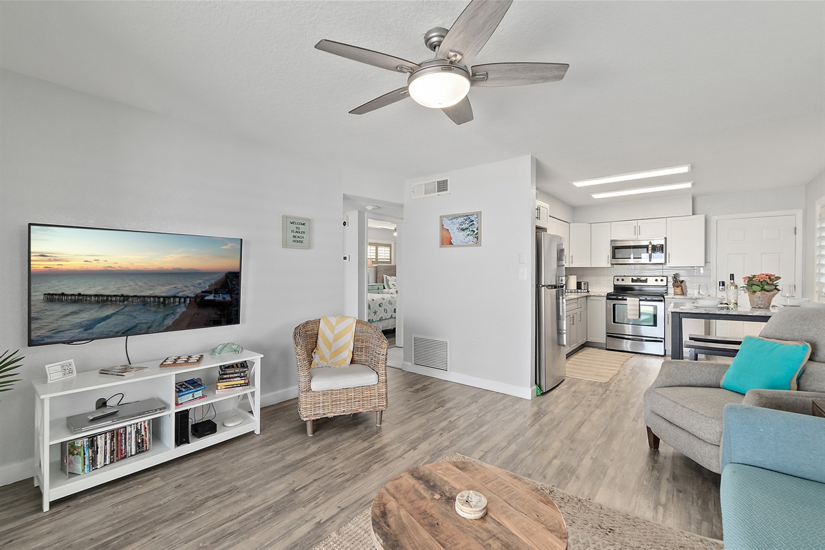 Open layout connecting living, kitchen, and dining