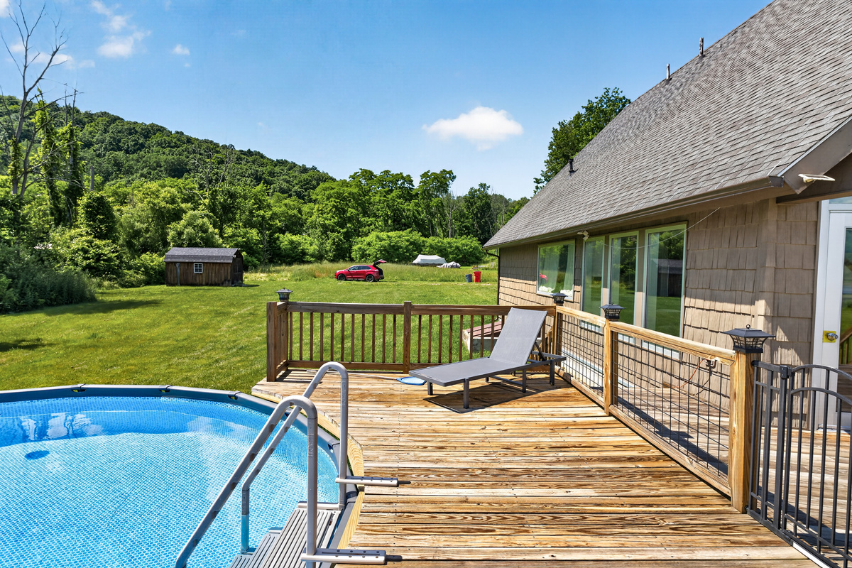 Pool deck with open water views