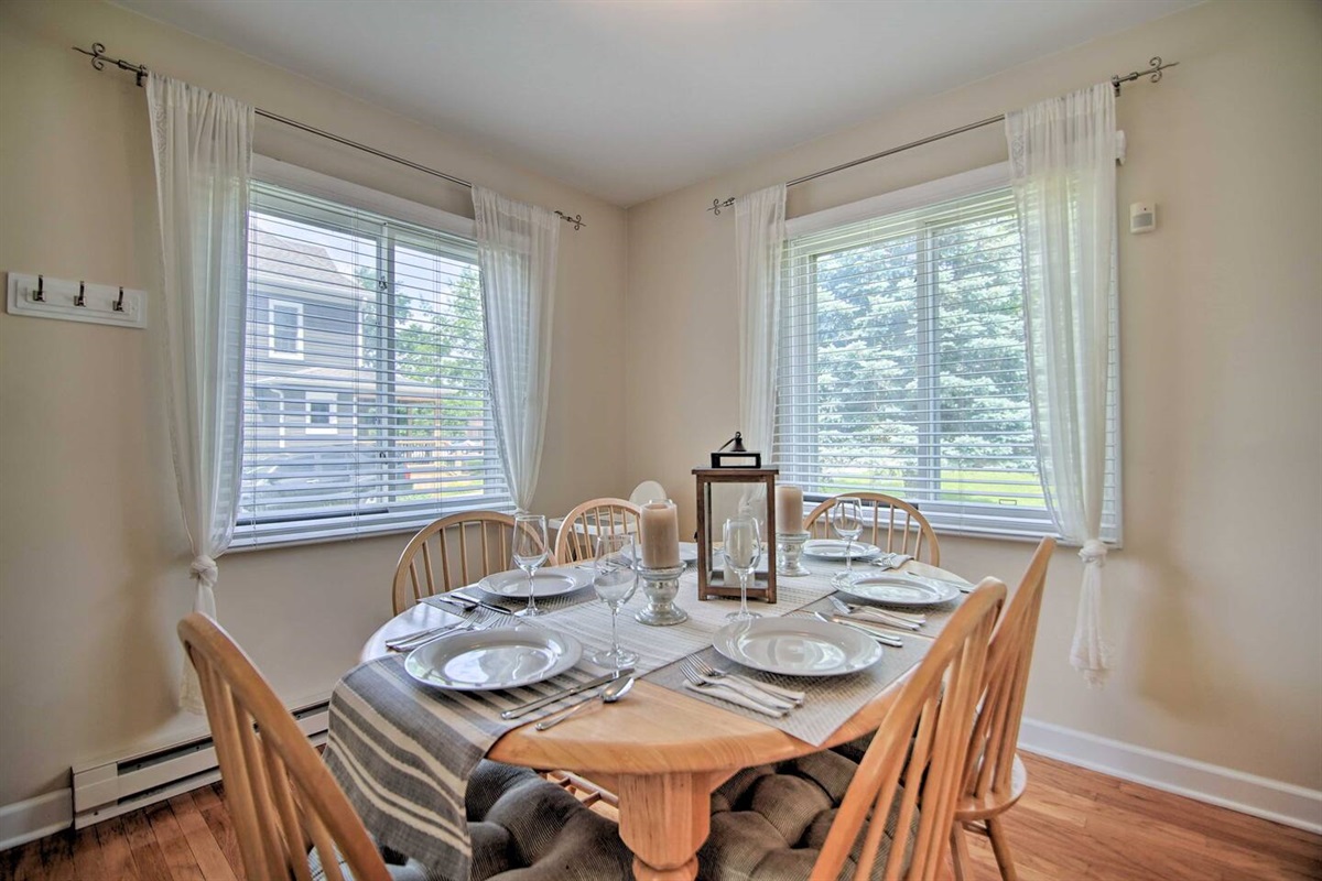 3Bd Unit: Gather for takeout or a home cooked meal with friends and family in the cozy dining room. A high chair is available.