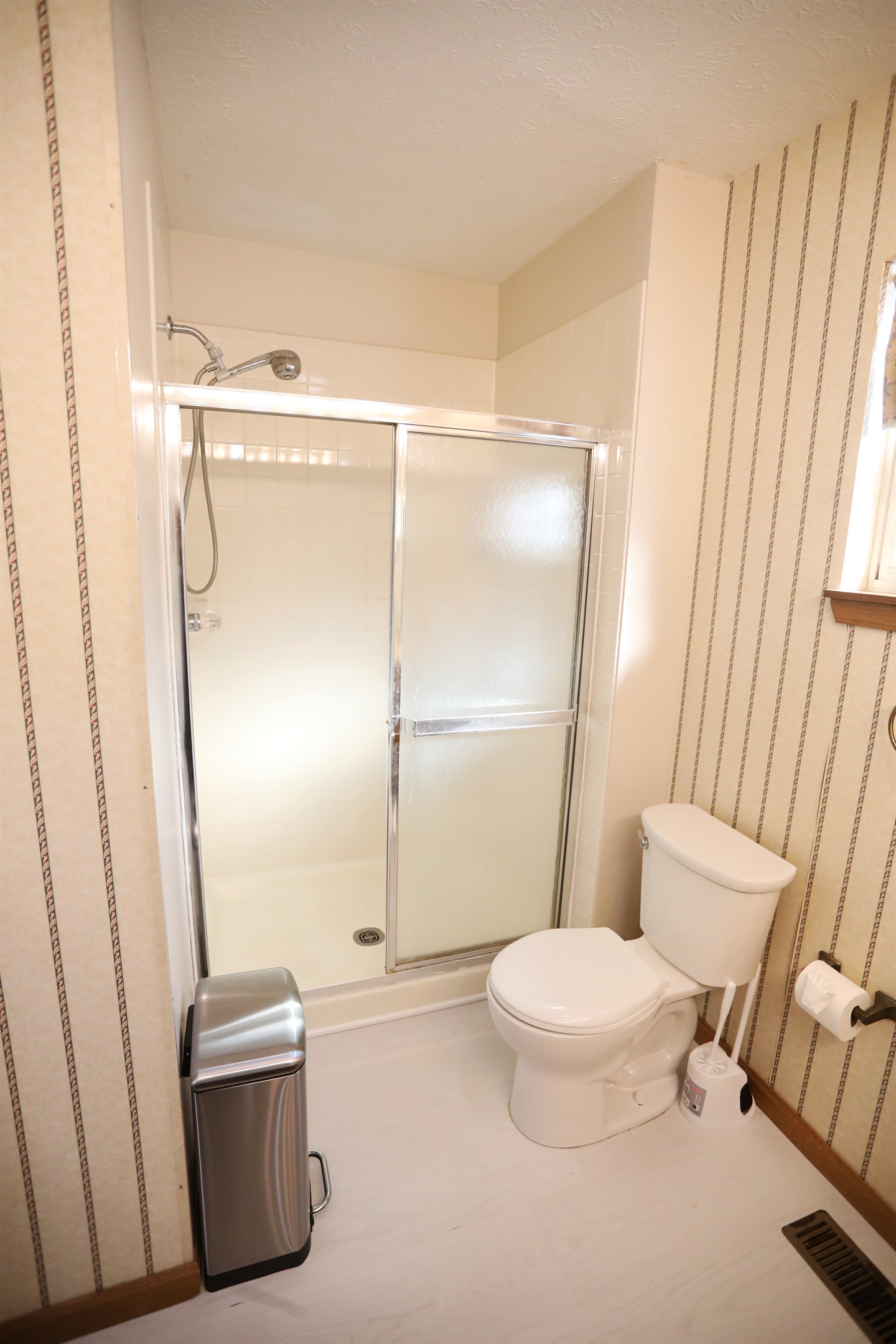 Master Suite full bathroom full bathroom showing toilet, walk-in shower in the background