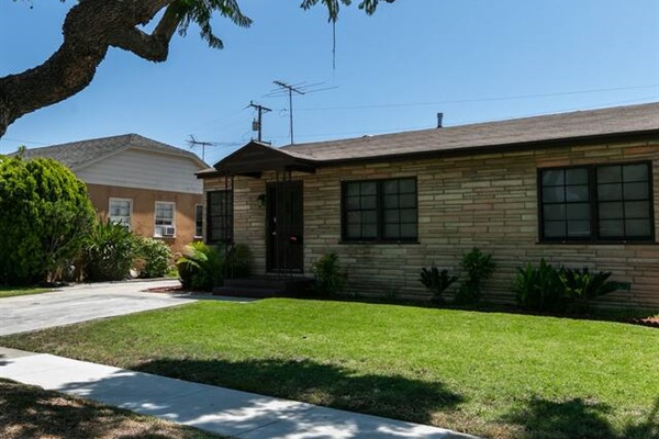 Neighborhood with sidewalks and shade trees blocks from historic Heartwell Park.  