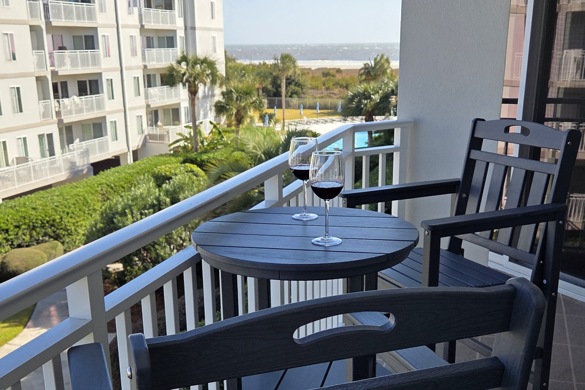Relax on the balcony with beach view.