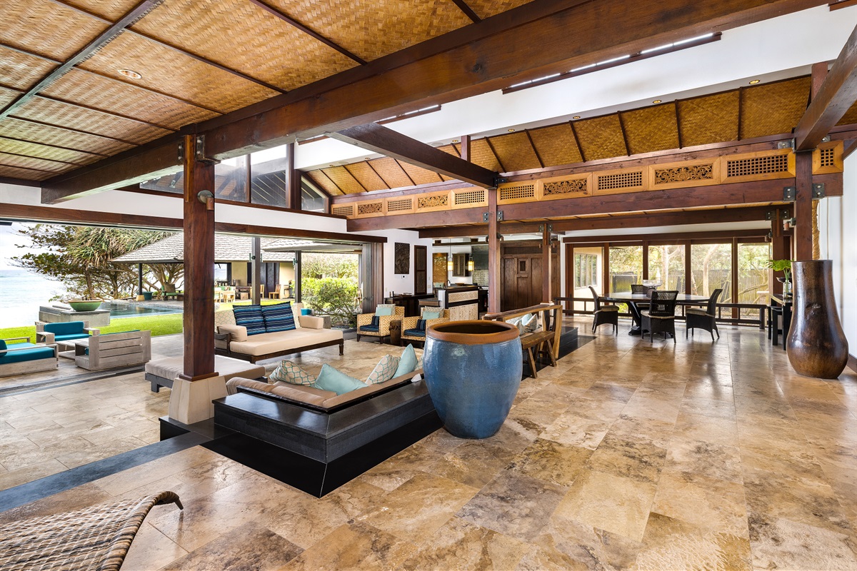 Large doors open for incredible views of the yard and ocean