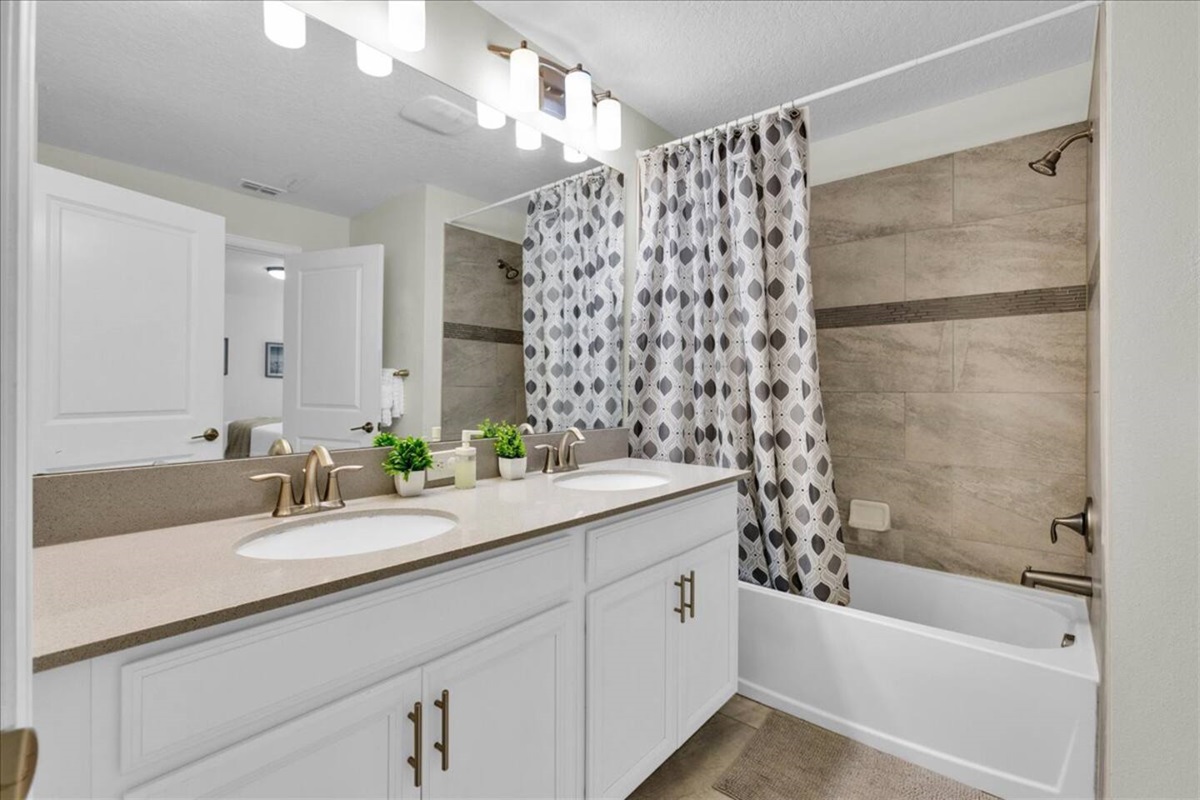 and it's own full en-suite bathroom with shower and bathtub.