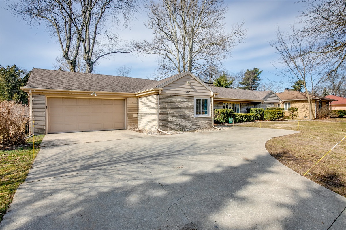 Easy INDOOR parking with attached 2 car garage and long driveway. One small step to enter front door.