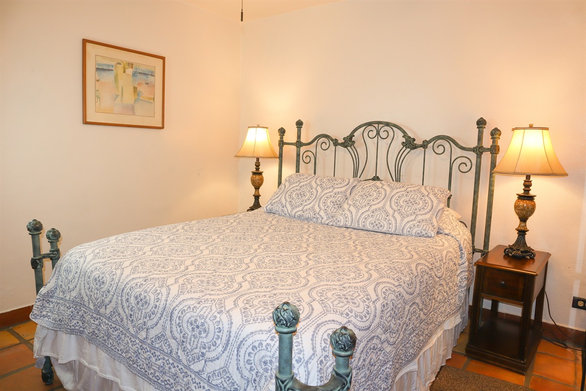 Circa Del Mar - Downstairs Bedroom 4 (North East) with a Queen bed with Wesley Allen headboard and open-toe foot posts.