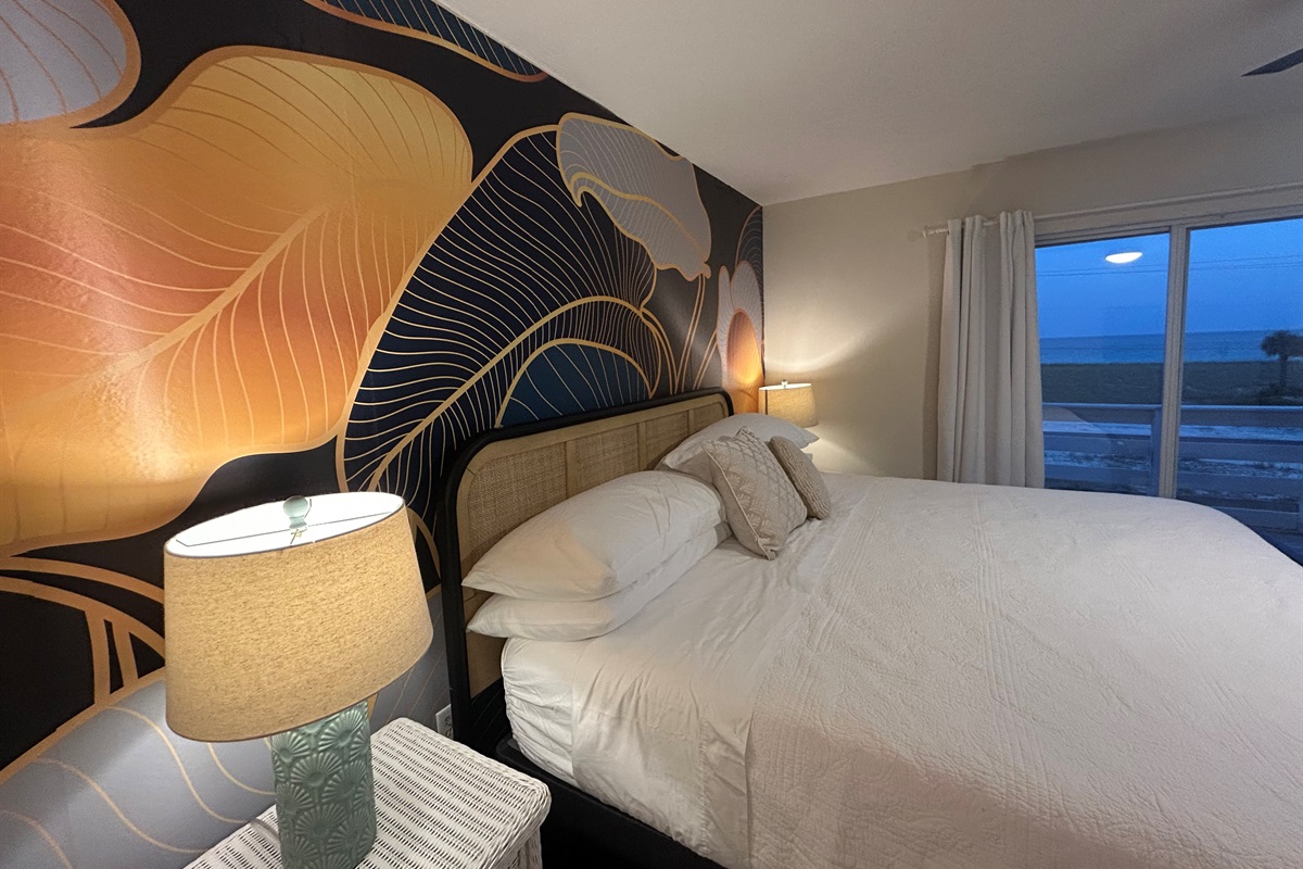 Wake up to the gentle sound of waves and the soft glow of morning light streaming through expansive windows.