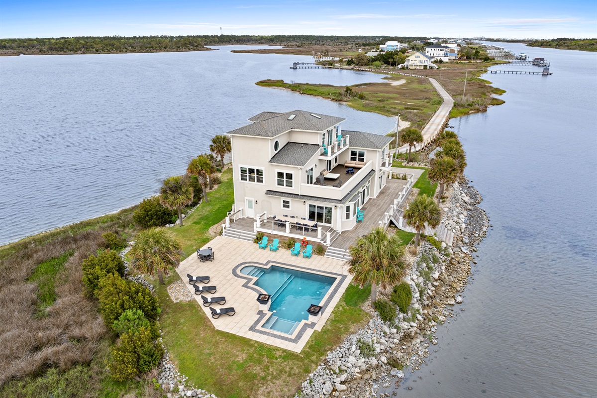 Enjoy unmatched privacy and breathtaking panoramic views from this incredible coastal estate