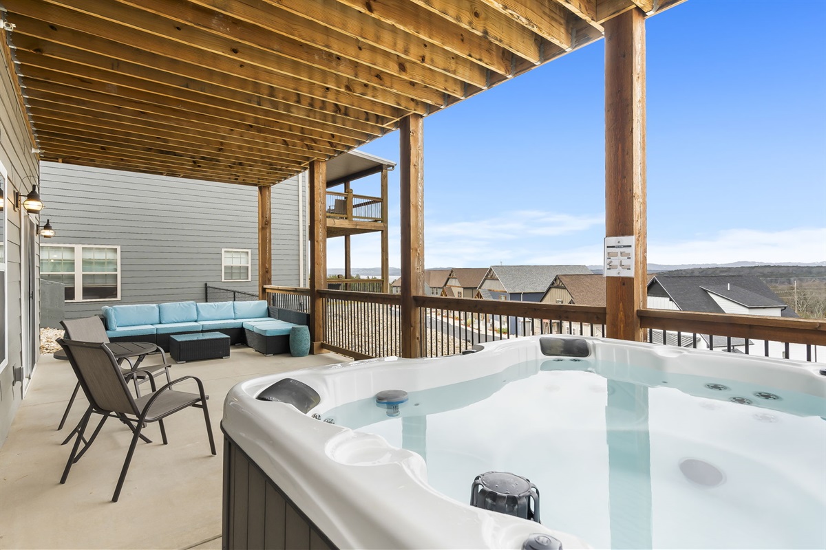 Lower level Hot tub and seating for a great night of fun!