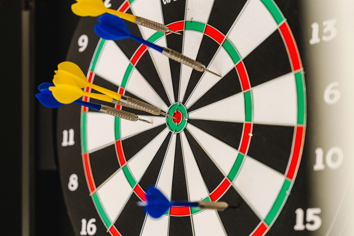 Sharpen your aim with a classic dartboard in the game room.
