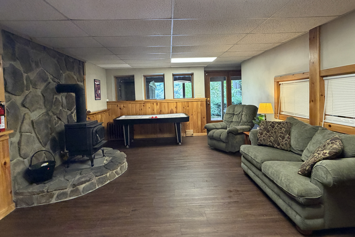 Lower Level game room with comfy seating and smart TV
