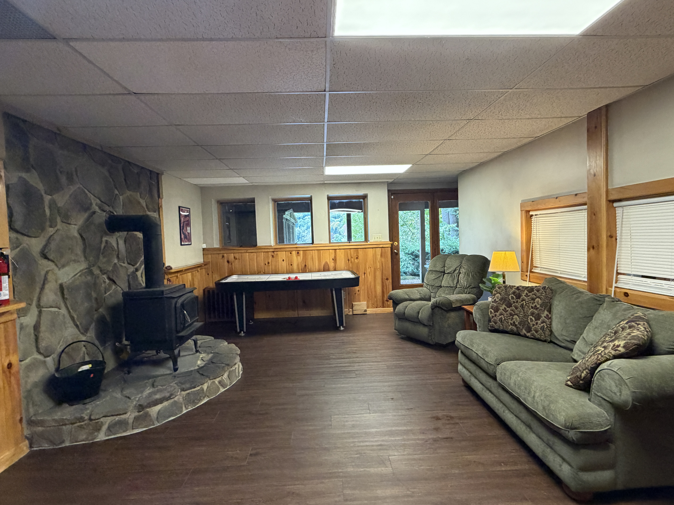 Lower Level game room with comfy seating and smart TV
