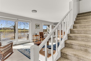 Stairs and living room with Lake view