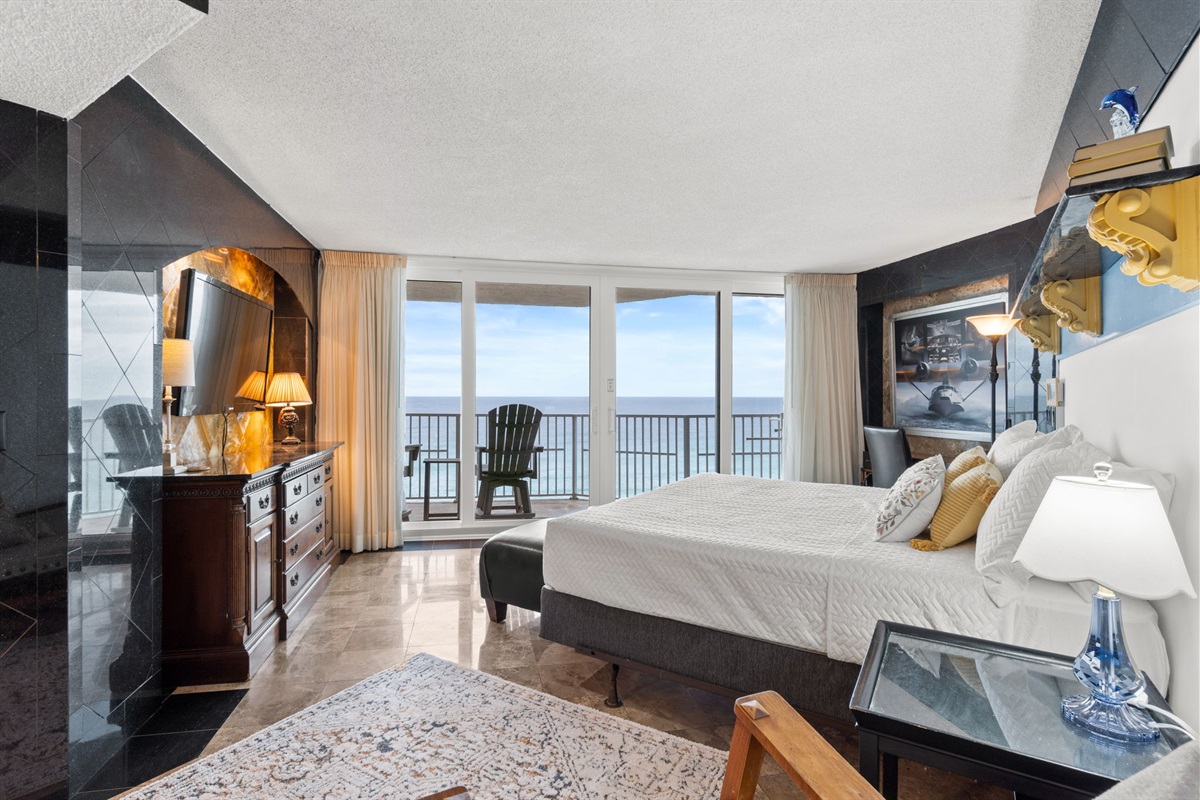 Bedroom 1 with King Bed, Balcony Access, and Beach Views